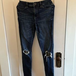 Distressed mid-rise jeans